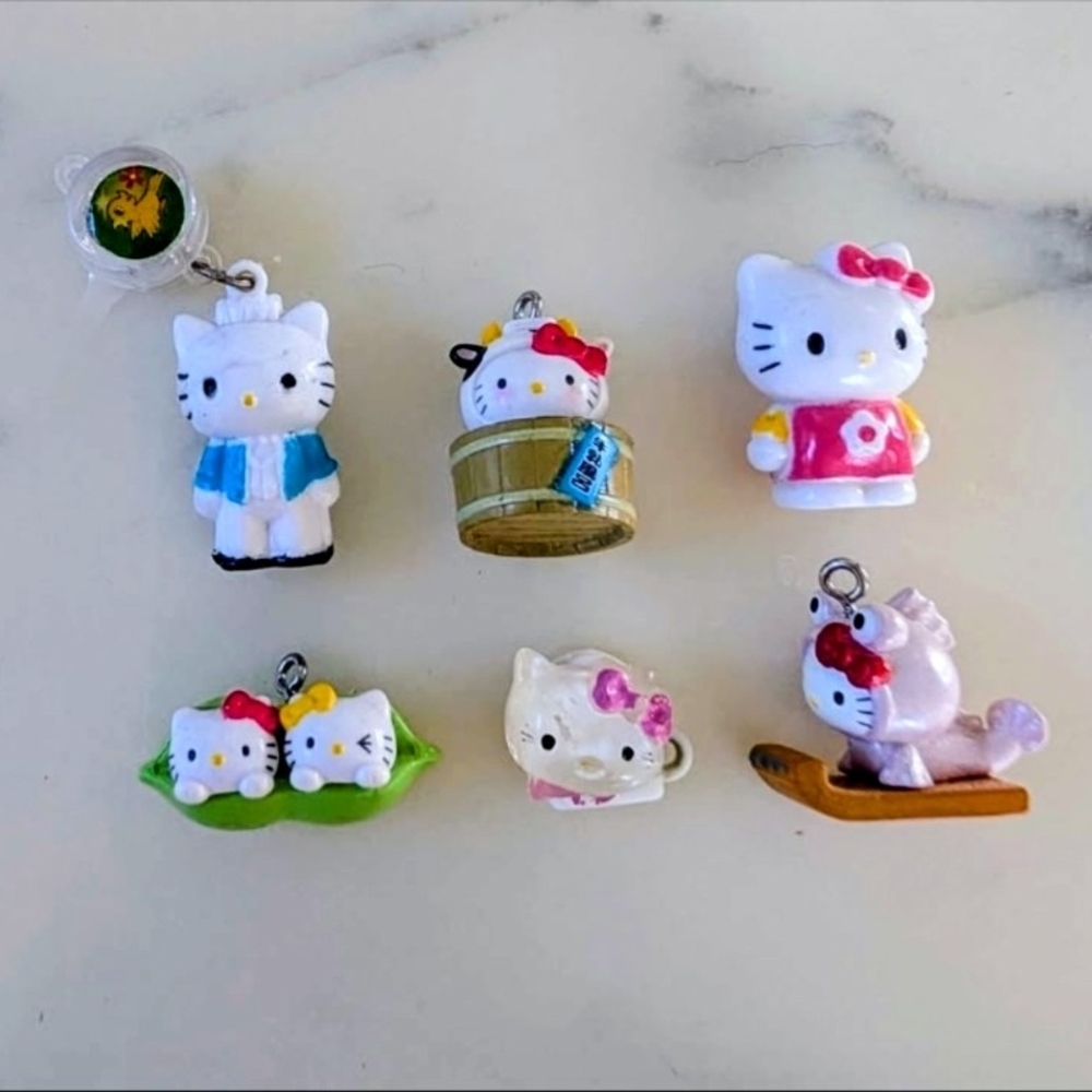 NWOT. Vintage Hello Kitty Figurine Collection -  Multicolor.